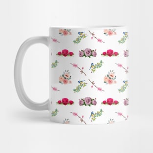 Red and pink roses mixed with blooming flowers and a bird Mug